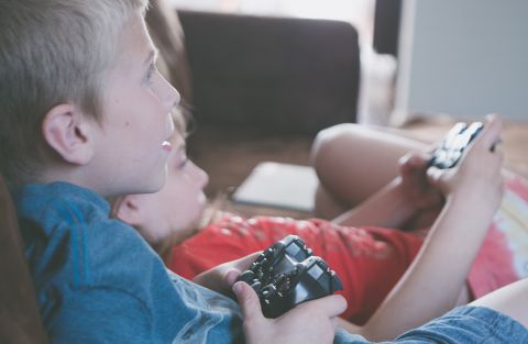 1595335115_two-boy-and-girl-holding-game-controllers-1103563.jpg